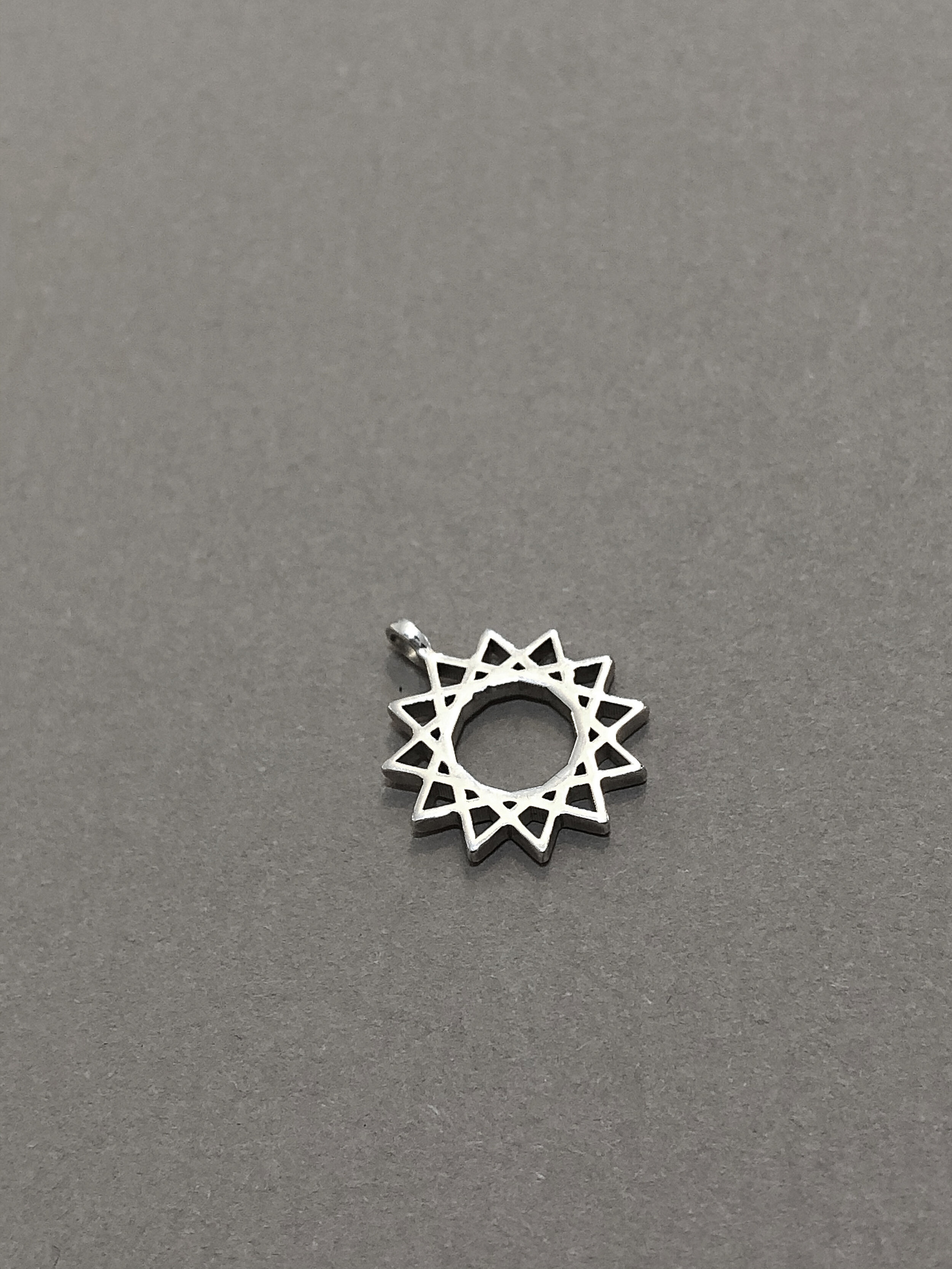 CHSTAR15MMSS STERLING SILVER 15MM 12 POINTED STAR CHARM